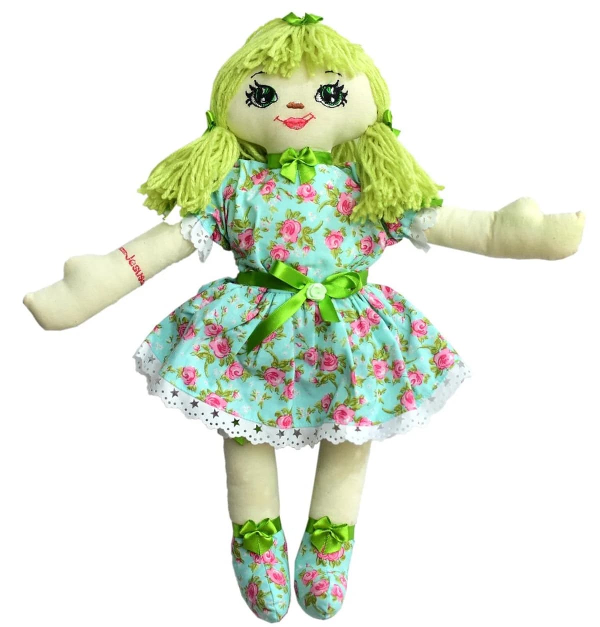 Boneca Rebeca: Cabelos verde-claros, vestido azul-claro floral e laços verdes.
